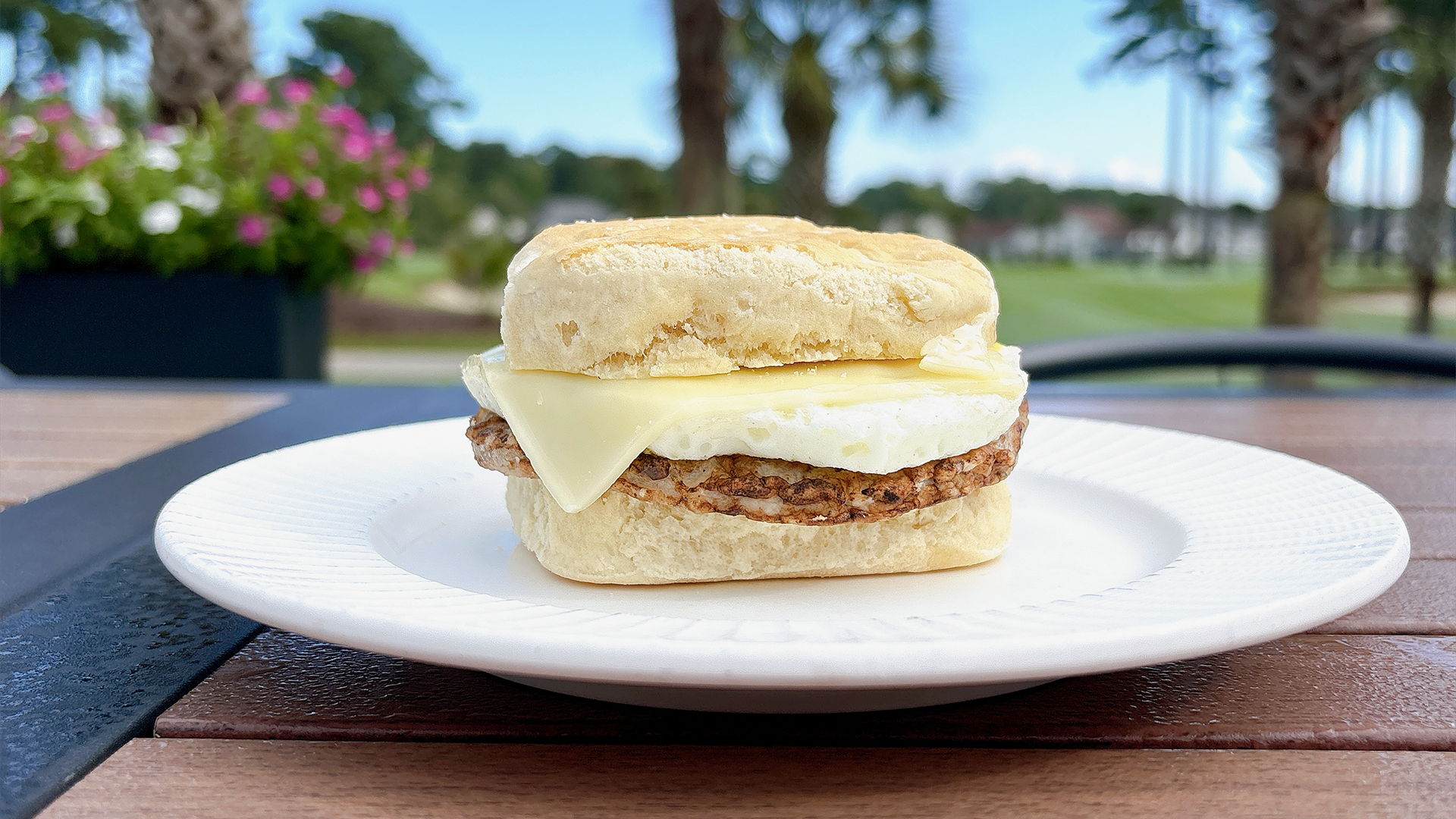 sausage, egg, and cheese on a biscuit for breakfast sandwich feature